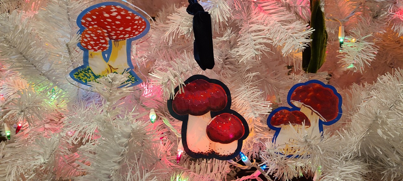 Acrylic mushroom ornaments in a white Christmas tree