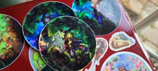A cute little witch running through the berries- now as a holographic sticker!
